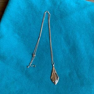 Kendra Scott shimmery rose gold necklace